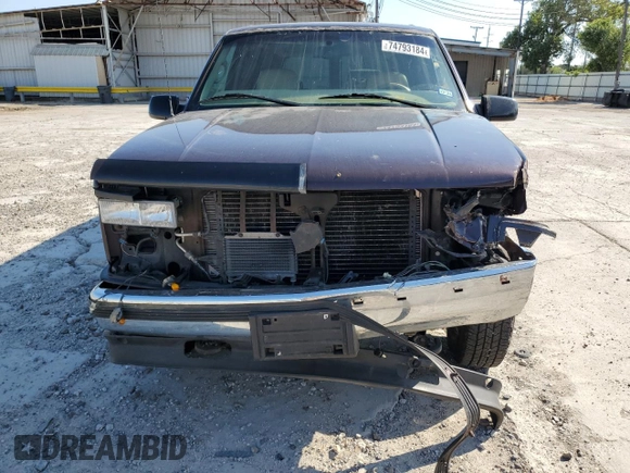 1997 GMC Yukon with VIN 1GKEK13R7VJ711782, listed as a Copart auction lot 74793184 with 208,718 mi miles and Salvage Title. Bid and sale history available at carsss.com. Image 5.
