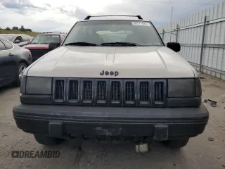 1995 Jeep Grand Cherokee Laredo with VIN 1J4GZ58S2SC703196, listed as a Copart auction lot 68571944 with 264,876 mi miles and Clean Title. Bid and sale history available at carsss.com. Image 5.