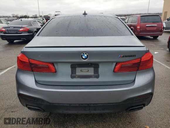 2018 BMW 5 Series M550i xDrive with VIN WBAJB9C54JB286707, listed as a Copart auction lot 49158435 with 74,307 mi miles and Salvage title. Bid and sale history available at DreamBid. Image 6.