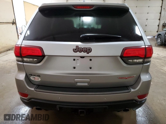 2017 Jeep Grand Cherokee Trailhawk with VIN 1C4RJFLG8HC618709, listed as a Copart auction lot 52899194 with 69,000 mi miles and Salvage title. Bid and sale history available at DreamBid. Image 6.