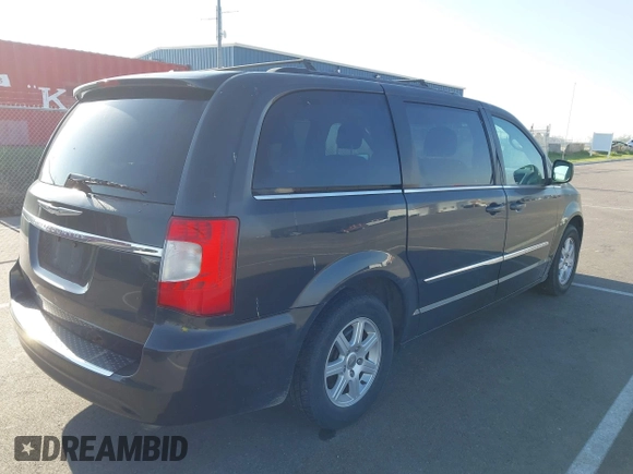 2011 Chrysler Town & Country Touring with VIN 2A4RR5DG6BR782499, listed as a IAAI auction lot 42063944 with 165,647 mi miles and . Bid and sale history available at DreamBid. Image 4.