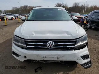 2019 Volkswagen Tiguan S with VIN 3VV0B7AX7KM106090, listed as a Copart auction lot 54771435 with 101,711 mi miles and Salvage title. Bid and sale history available at DreamBid. Image 5.