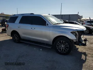 2019 Ford Expedition Limited with VIN 1FMJU1KTXKEA58799, listed as a Copart auction lot 57671335 with 106,848 mi miles and Salvage title. Bid and sale history available at DreamBid. Image 4.
