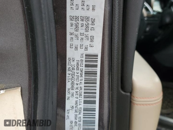 2016 Jeep Grand Cherokee Limited 75th Anniversary with VIN 1C4RJFBG4GC489464, listed as a Copart auction lot 55278935 with 176,572 mi miles and Salvage Title. Bid and sale history available at DreamBid. Image 14.