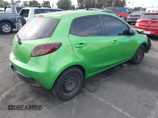 2012 Mazda 2 Sport with VIN JM1DE1KZ4C0140559, listed as a IAAI auction lot 41265959 with 139,364 mi miles and . Bid and sale history available at DreamBid. Image 4.
