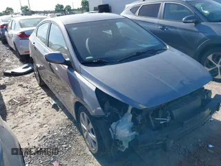 2014 Hyundai Accent GLS z VIN KMHCU4AE3EU590273, wystawiony jako IAAI lot #42298172 z przebiegiem 87 278 mil mil oraz . Historia ofert i sprzedaży dostępna na DreamBid. Obrazek 1.