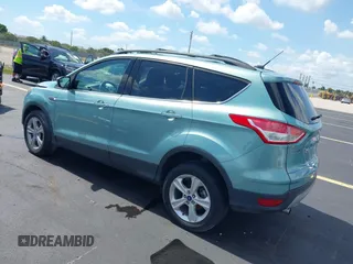 2013 Ford Escape SE with VIN 1FMCU9GX0DUC75662, listed as a IAAI auction lot 42549360 with 156,666 mi miles and . Bid and sale history available at DreamBid. Image 3.