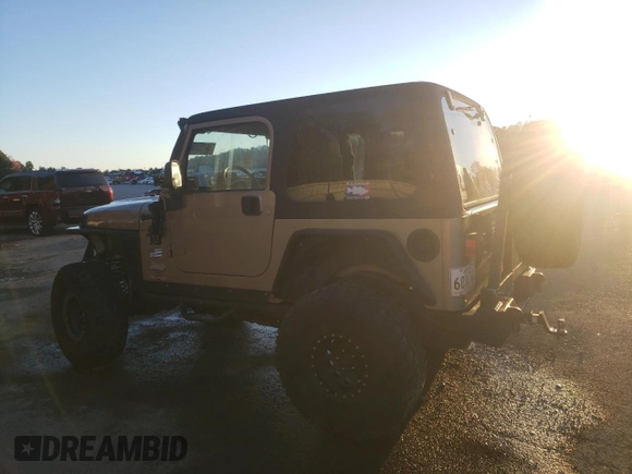 2004 Jeep Wrangler Rubicon with VIN 1J4FA69S74P787812, listed as a Copart auction lot 84715464 with 150,320 mi miles and Salvage Title. Bid and sale history available at carsss.com. Image 2.
