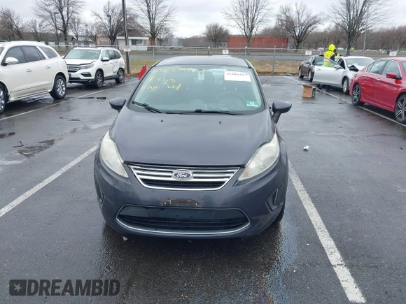 2012 Ford Fiesta SE with VIN 3FADP4BJ0CM155729, listed as a IAAI auction lot 41800447 with 90,091 mi miles. Bid and sale history available at carsss.com. Image 12.