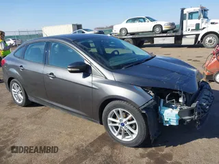 2016 Ford Focus SE with VIN 1FADP3F21GL212718, listed as a IAAI auction lot 41785985 with 101,198 mi miles. Bid and sale history available at carsss.com. Image 1.