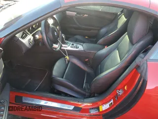 2011 BMW Z4 sDrive35is with VIN WBALM1C54BE393857, listed as a Copart auction lot 72769234 with 88,986 mi miles and Salvage Title. Bid and sale history available at carsss.com. Image 7.