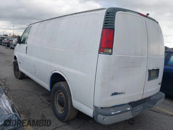2002 GMC Savana z VIN 1GTHG35F021200273, wystawiony jako IAAI lot #41600511 z przebiegiem 230 052 mil mil oraz . Historia ofert i sprzedaży dostępna na DreamBid. Obrazek 3.