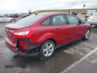 2014 Ford Focus SE with VIN 1FADP3F22EL112110, listed as a IAAI auction lot 41582585 with 107,285 mi miles. Bid and sale history available at carsss.com. Image 4.