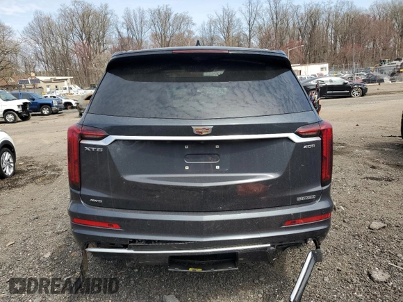 2022 Cadillac XT6 Premium Luxury with VIN 1GYKPDRS9NZ120814, listed as a Copart auction lot 51143485 with 70,977 mi miles and Salvage Title. Bid and sale history available at carsss.com. Image 6.