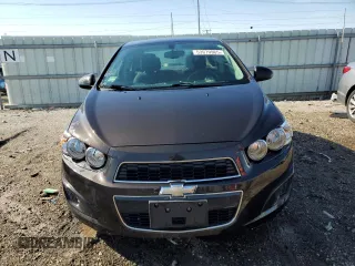 2015 Chevrolet Sonic LT z VIN 1G1JC5SH2F4200996, wystawiony jako Copart lot #53979965 z przebiegiem 129 200 mil mil oraz Szkoda całkowita • Salvage title. Historia ofert i sprzedaży dostępna na DreamBid. Obrazek 5.