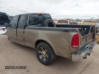 2003 Ford F-150 XL with VIN 1FTRX18LX3NB05434, listed as a IAAI auction lot 41799343 with 1 mi miles. Bid and sale history available at carsss.com. Image 3.