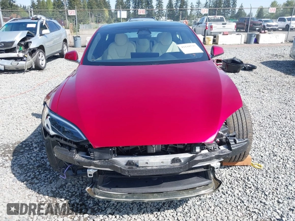 2023 Tesla Model S with VIN 5YJSA1E5XPF516779, listed as a IAAI auction lot 42110737 with 16,465 mi miles and . Bid and sale history available at DreamBid. Image 13.