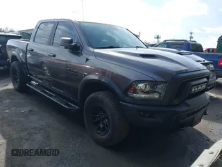 2017 Ram 1500 Rebel z VIN 1C6RR7YT0HS784756, wystawiony jako IAAI lot #41543549 z przebiegiem 146 727 mil mil oraz . Historia ofert i sprzedaży dostępna na DreamBid. Obrazek 1.