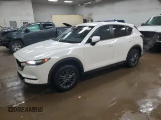 2019 Mazda CX-5 Touring with VIN JM3KFBCM1K0697500, listed as a Copart auction lot 46460735 with 69,412 mi miles and Salvage Title. Bid and sale history available at carsss.com. Image 1.