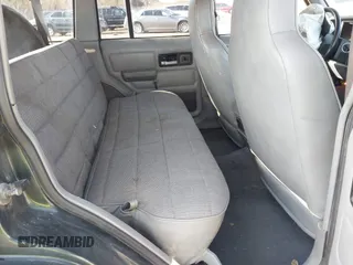 1996 Jeep Cherokee Sport with VIN 1J4FJ68S2TL299150, listed as a IAAI auction lot 41932867 with 142,761 mi miles. Bid and sale history available at carsss.com. Image 8.