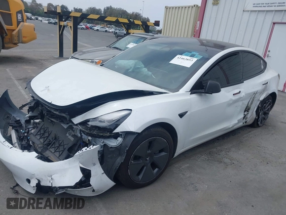 2023 Tesla Model 3 with VIN 5YJ3E1EA2PF417959, listed as a IAAI auction lot 42463853 with 22,736 mi miles and . Bid and sale history available at DreamBid. Image 21.