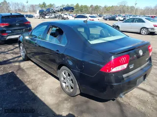 2011 Mercury Milan Premier with VIN 3MEHM0JG8BR603346, listed as a IAAI auction lot 41958444 with 124,860 mi miles. Bid and sale history available at carsss.com. Image 3.