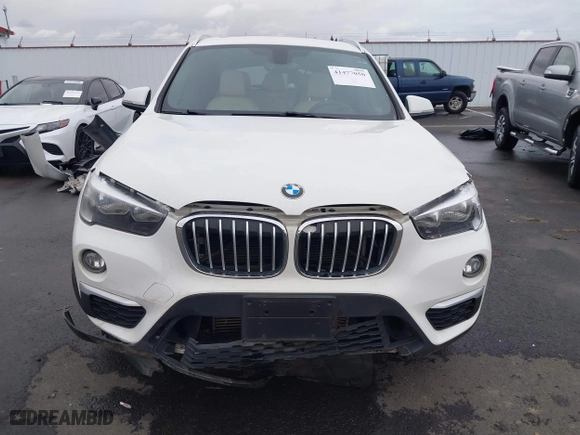 2018 BMW X1 sDrive28i with VIN WBXHU7C32J5H44246, listed as a IAAI auction lot 41477050 with 69,858 mi miles. Bid and sale history available at carsss.com. Image 12.