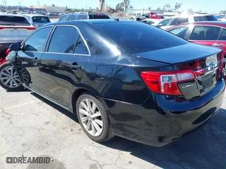 2014 Toyota Camry Hybrid LE with VIN 4T1BD1FK1EU127878, listed as a IAAI auction lot 41823638 with 179,141 mi miles. Bid and sale history available at carsss.com. Image 3.