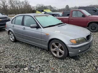 2004 BMW 3 Series 325i with VIN WBAEV33474KL63524, listed as a Copart auction lot 43437215 with 164,415 mi miles and Salvage Title. Bid and sale history available at carsss.com. Image 4.