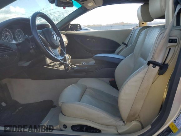 2006 BMW 6 Series 650Ci z VIN WBAEK13416CN76818, wystawiony jako Copart lot #83292504 z przebiegiem 94 653 mil mil oraz Czysty tytuł • Clean title. Historia ofert i sprzedaży dostępna na DreamBid. Obrazek 7.