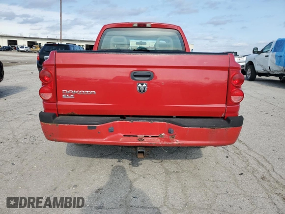 2005 Dodge Dakota SLT z VIN 1D7HW48K05S310312, wystawiony jako Copart lot #88061125 z przebiegiem 208 806 mil mil oraz Nie do naprawy • Non repairable. Historia ofert i sprzedaży dostępna na DreamBid. Obrazek 6.