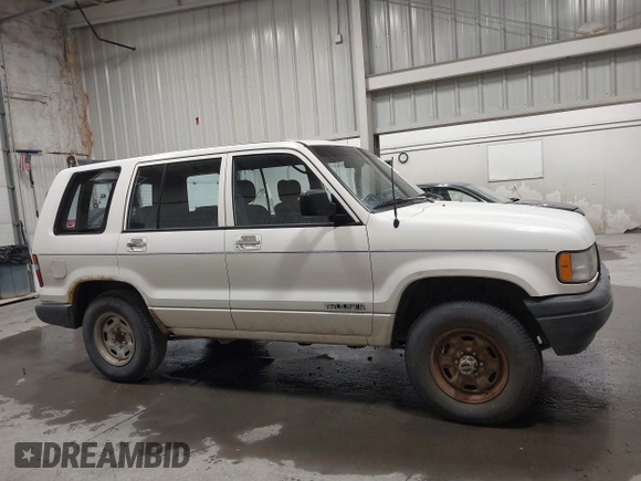 1994 Isuzu Trooper z VIN JACDH58V9R7919182, wystawiony jako IAAI lot #42333093 z przebiegiem 192 819 mil mil oraz . Historia ofert i sprzedaży dostępna na DreamBid. Obrazek 13.