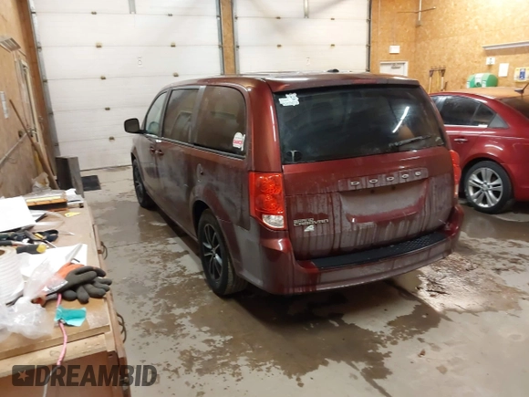 2019 Dodge Grand Caravan SE with VIN 2C4RDGBG6KR502910, listed as a IAAI auction lot 41395445 with 144,238 mi miles and . Bid and sale history available at DreamBid. Image 3.