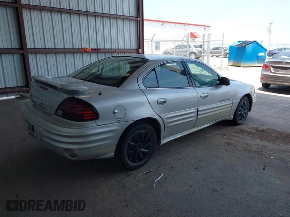 2001 Pontiac Grand Am SE with VIN 1G2NE52T81M648017, listed as a IAAI auction lot 42354372 with 206,086 mi miles and . Bid and sale history available at DreamBid. Image 4.