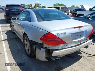2005 Mercedes-Benz SL 500 z VIN WDBSK75F55F098924, wystawiony jako IAAI lot #42215237 z przebiegiem 211 102 mil mil oraz . Historia ofert i sprzedaży dostępna na DreamBid. Obrazek 3.