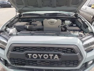 2022 Toyota Tacoma SR with VIN 3TMCZ5AN0NM507320, listed as a IAAI auction lot 42220296 with 33,342 mi miles and . Bid and sale history available at DreamBid. Image 10.