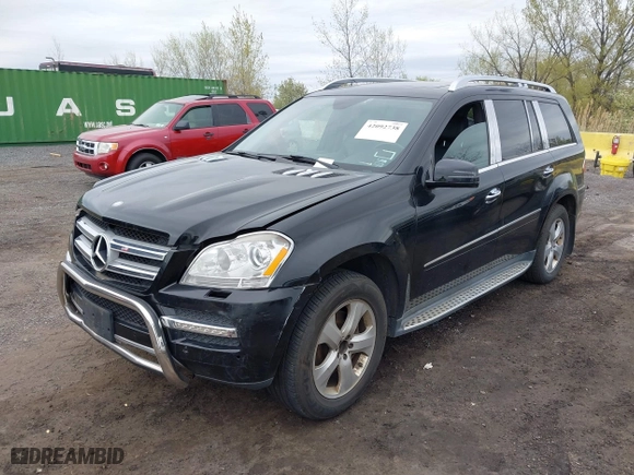 2012 Mercedes-Benz GL-Class GL 450 with VIN 4JGBF7BE9CA763928, listed as a IAAI auction lot 42092738 with 168,971 mi miles. Bid and sale history available at carsss.com. Image 2.