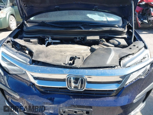 2020 Honda Pilot Elite with VIN 5FNYF6H02LB054348, listed as a IAAI auction lot 42302525 with 43,916 mi miles and . Bid and sale history available at DreamBid. Image 10.