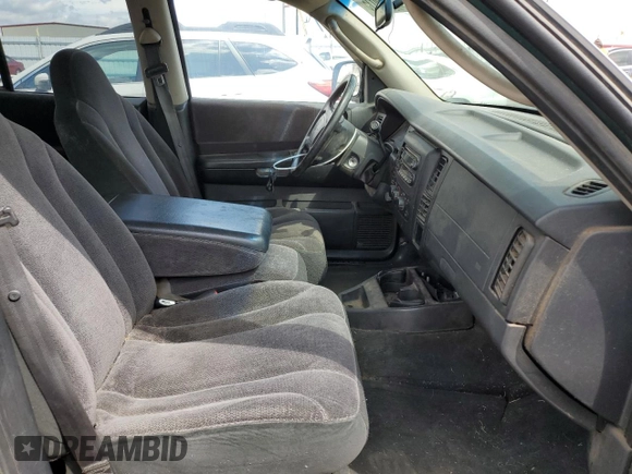 2001 Dodge Dakota z VIN 1B7HG2AX81S320355, wystawiony jako Copart lot #55410715 z przebiegiem 164 931 mil mil oraz Szkoda całkowita • Salvage title. Historia ofert i sprzedaży dostępna na DreamBid. Obrazek 7.