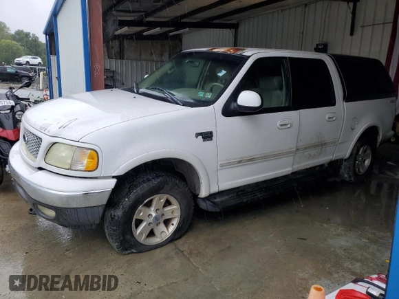 2002 Ford F-150 XLT with VIN 1FTRW08692KE20555, listed as a Copart auction lot 73571414 with 166,288 mi miles and Clean Title. Bid and sale history available at carsss.com. Image 1.