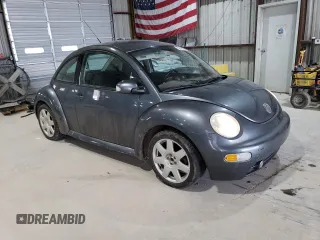 2003 Volkswagen New Beetle Coupe GLS with VIN 3VWCK21C33M436156, listed as a Copart auction lot 52589765 with 129,244 mi miles and Salvage Title. Bid and sale history available at carsss.com. Image 4.