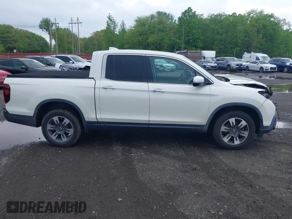 2019 Honda Ridgeline RTL-E with VIN 5FPYK3F75KB020713, listed as a IAAI auction lot 42191152 with 31,245 mi miles and . Bid and sale history available at DreamBid. Image 13.