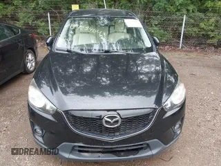2013 Mazda CX-5 Sport with VIN JM3KE2BE8D0125002, listed as a IAAI auction lot 42425404 with 183,551 mi miles and . Bid and sale history available at DreamBid. Image 6.