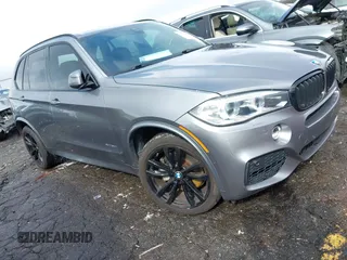 2014 BMW X5 xDrive50i z VIN 5UXKR6C58E0J71741, wystawiony jako IAAI lot #41568119 z przebiegiem 76 479 mil mil oraz . Historia ofert i sprzedaży dostępna na DreamBid. Obrazek 1.