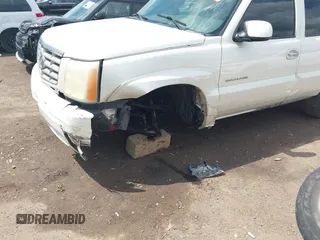 2003 Cadillac Escalade z VIN 1GYEK63N43R166347, wystawiony jako IAAI lot #42377612 z przebiegiem 255 892 mil mil oraz . Historia ofert i sprzedaży dostępna na DreamBid. Obrazek 6.