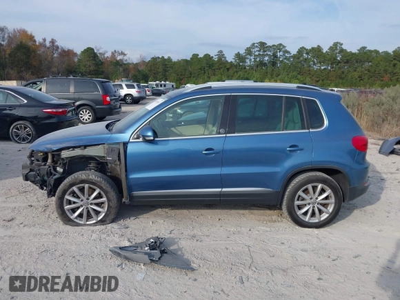 2017 Volkswagen Tiguan Wolfsburg Edition with VIN WVGRV7AX6HW504313, listed as a IAAI auction lot 40950812 with 149,884 mi miles and . Bid and sale history available at DreamBid. Image 14.
