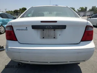 2007 Ford Focus S z VIN 1FAFP34NX7W106482, wystawiony jako Copart lot #57675245 z przebiegiem 170 237 mil mil oraz Szkoda całkowita • Salvage title. Historia ofert i sprzedaży dostępna na DreamBid. Obrazek 6.