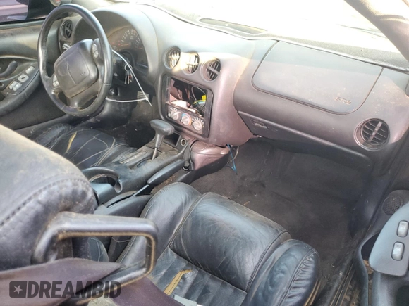 2000 Pontiac Firebird Formula z VIN 2G2FV22G4Y2175318, wystawiony jako Copart lot #68737224 z przebiegiem 229 394 mil mil oraz Szkoda całkowita • Salvage title. Historia ofert i sprzedaży dostępna na DreamBid. Obrazek 8.