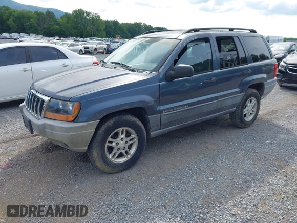 2002 Jeep Grand Cherokee Laredo with VIN 1J4GW48S92C150162, listed as a IAAI auction lot 42471732 with 171,677 mi miles and . Bid and sale history available at DreamBid. Image 2.