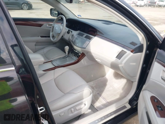 2010 Toyota Avalon XL with VIN 4T1BK3DB1AU356186, listed as a IAAI auction lot 41704838 with 150,462 mi miles and . Bid and sale history available at carsss.com. Image 5.